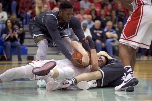 Oenis Medina (44) of Reading goes to the ground to grab a loose ball against Allderdice during their PIAA Class AAAA boys basketball semifinal Tuesday night at Chambersburg High School. (Ashley J. Palmer - For PA Prep Live)