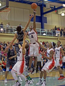 Lonnie Walker IV (4) of Reading leaps for a rebound against Allderdice's James Jackson during their PIAA Class AAAA boys basketball semifinal Tuesday night at Chambersburg High School. (Ashley J. Palmer - For PA Prep Live)