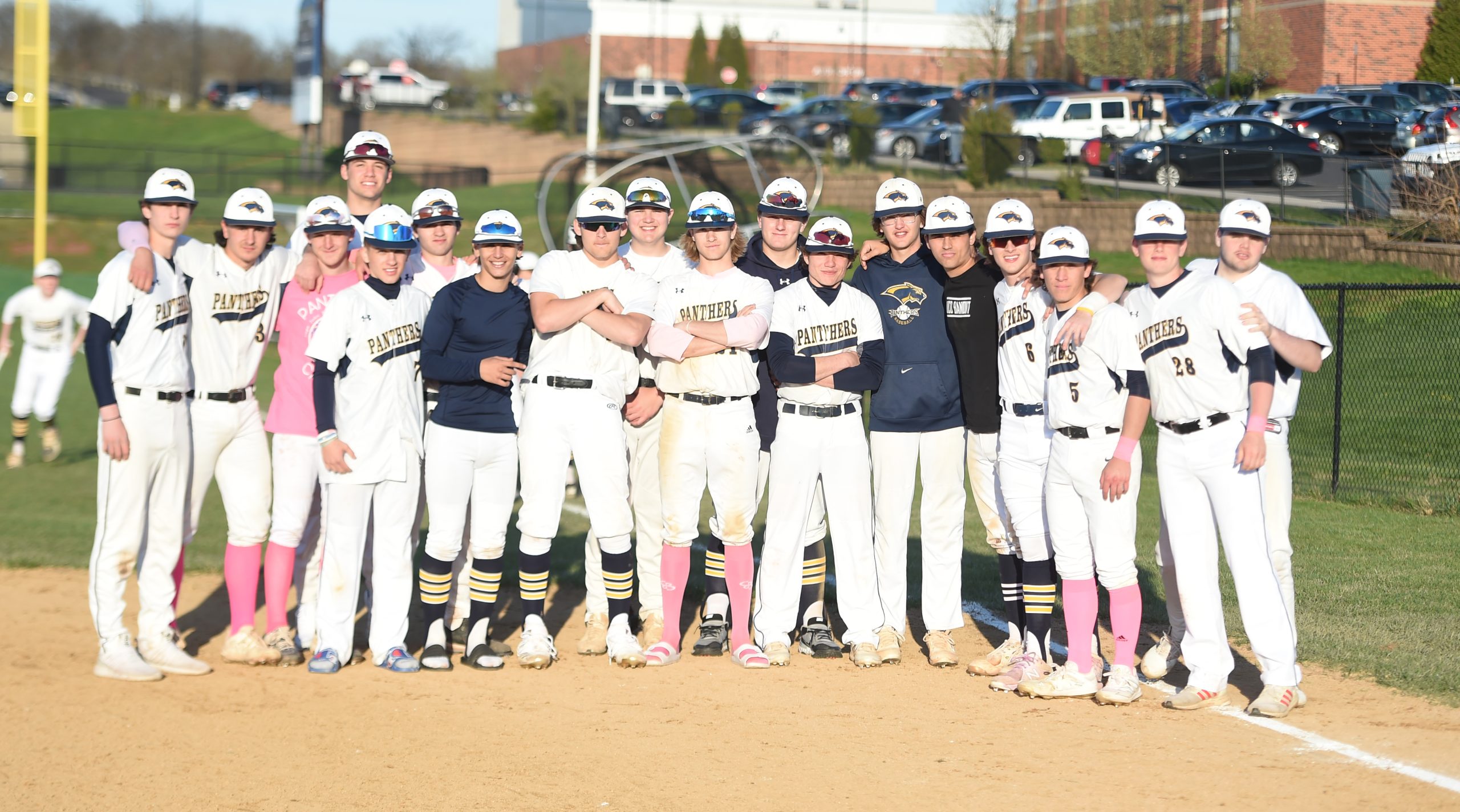 Pope John Paul II baseball rallies for coach and cancer survivor